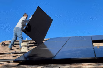 solar panels and man