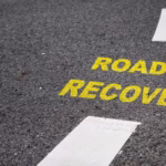 road to recovery text on road in capital latters